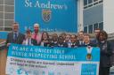 Staff and pupils at St Andrew's Secondary celebrate their human rights award success.
