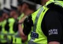 Man arrested after 'dog on dog attack' on busy Glasgow street