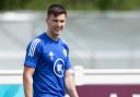Kieran Tierney trains with Scotland ahead of England clash but limps through running drill