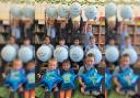 Children at Mount Florida celebrate the inspection report success
