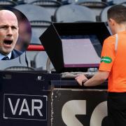 A Scottish referee looks at a replay on a pitchside monitor during a VAR check, main picture, and Philippe Clement, inset