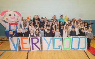 The pupils are celebrating their 'very good' inspection report