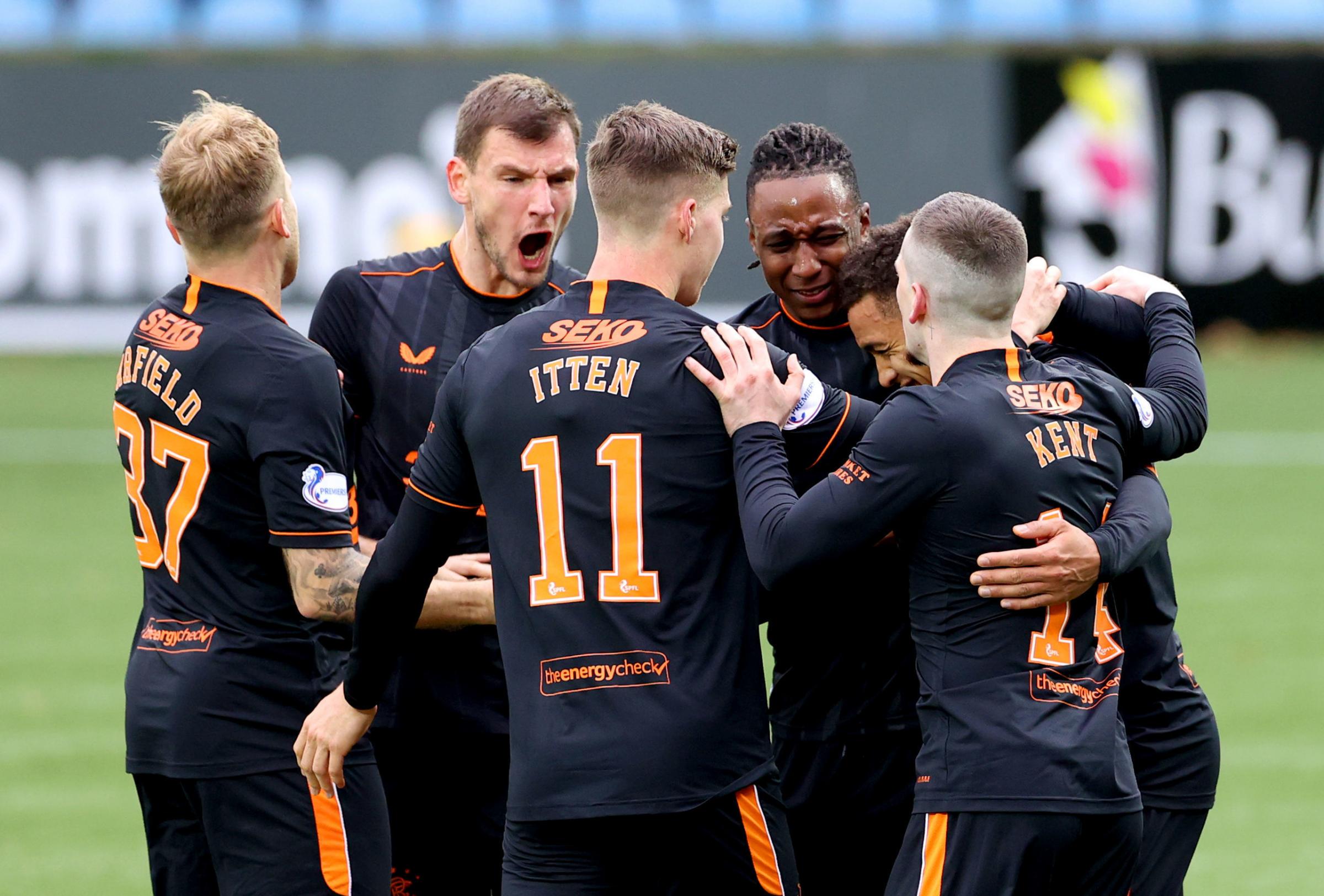 Rangers James Tavernier celebrates with his teammates after scoring his sides first goal of the game from the penalty spot during the Scottish Premiership match at Rugby Park