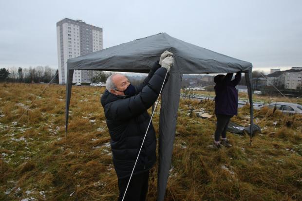 Glasgow Times: Living Rent activists erecting the gazebo for the occupation