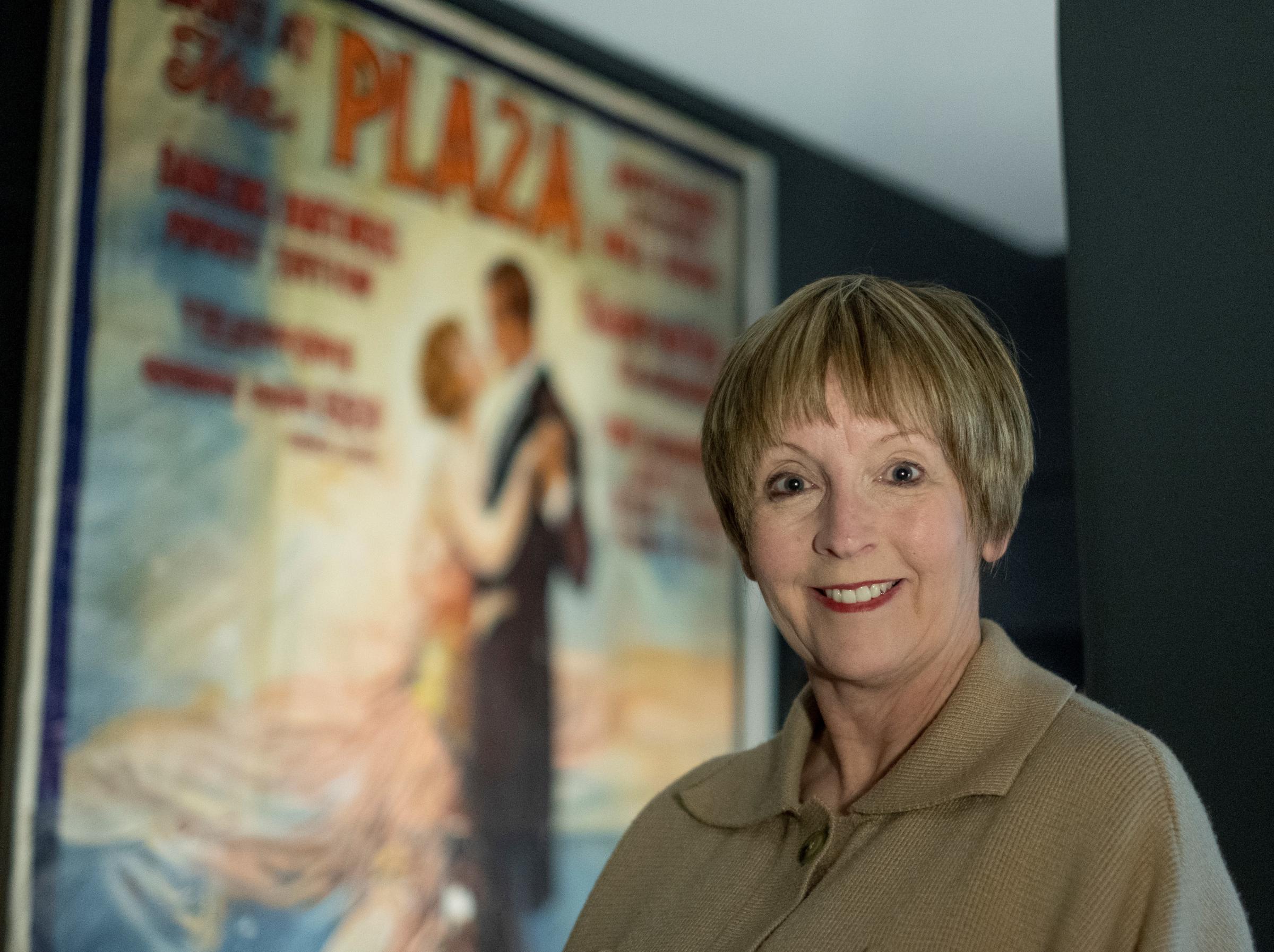 Lesley Wood with the restored poster