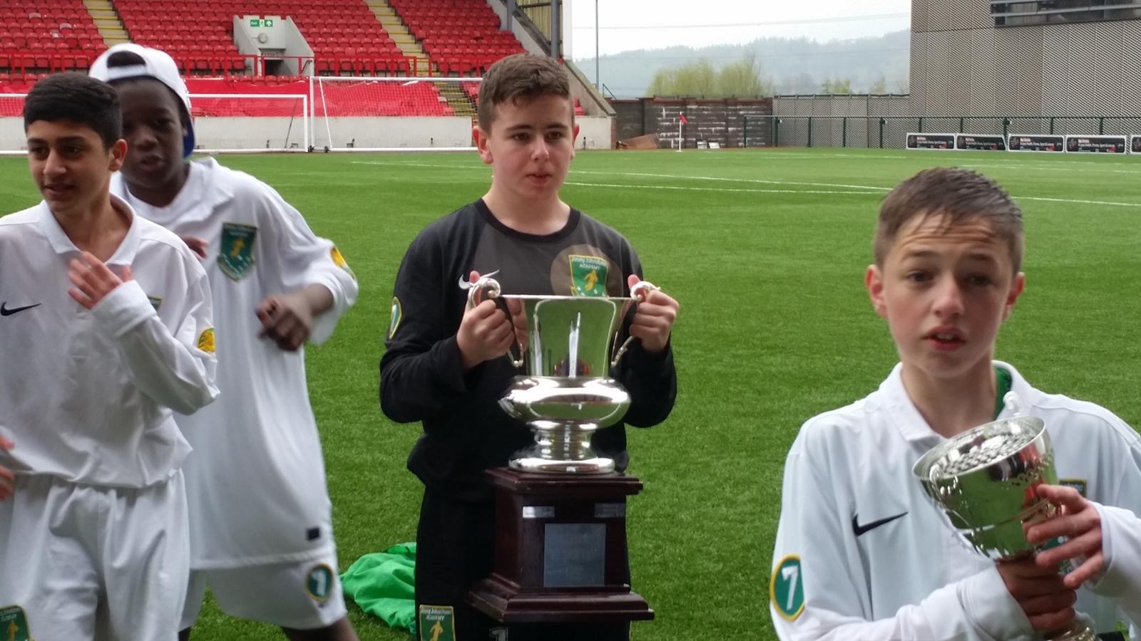 Liam winning a trophy