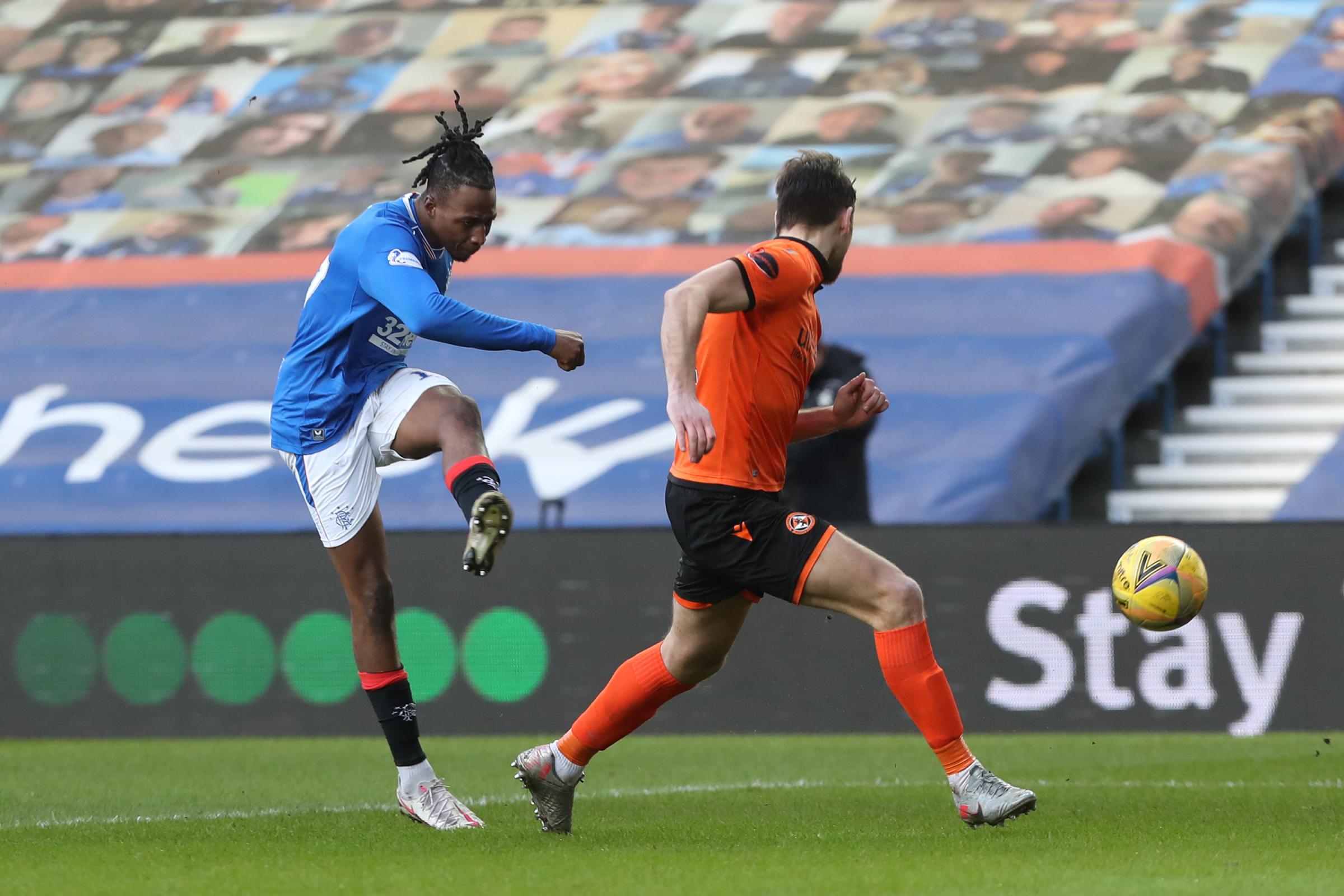 Joe Aribo of Rangers scores their sides third goal during the Ladbrokes Scottish Premiership match between Rangers and Dundee United at Ibrox
