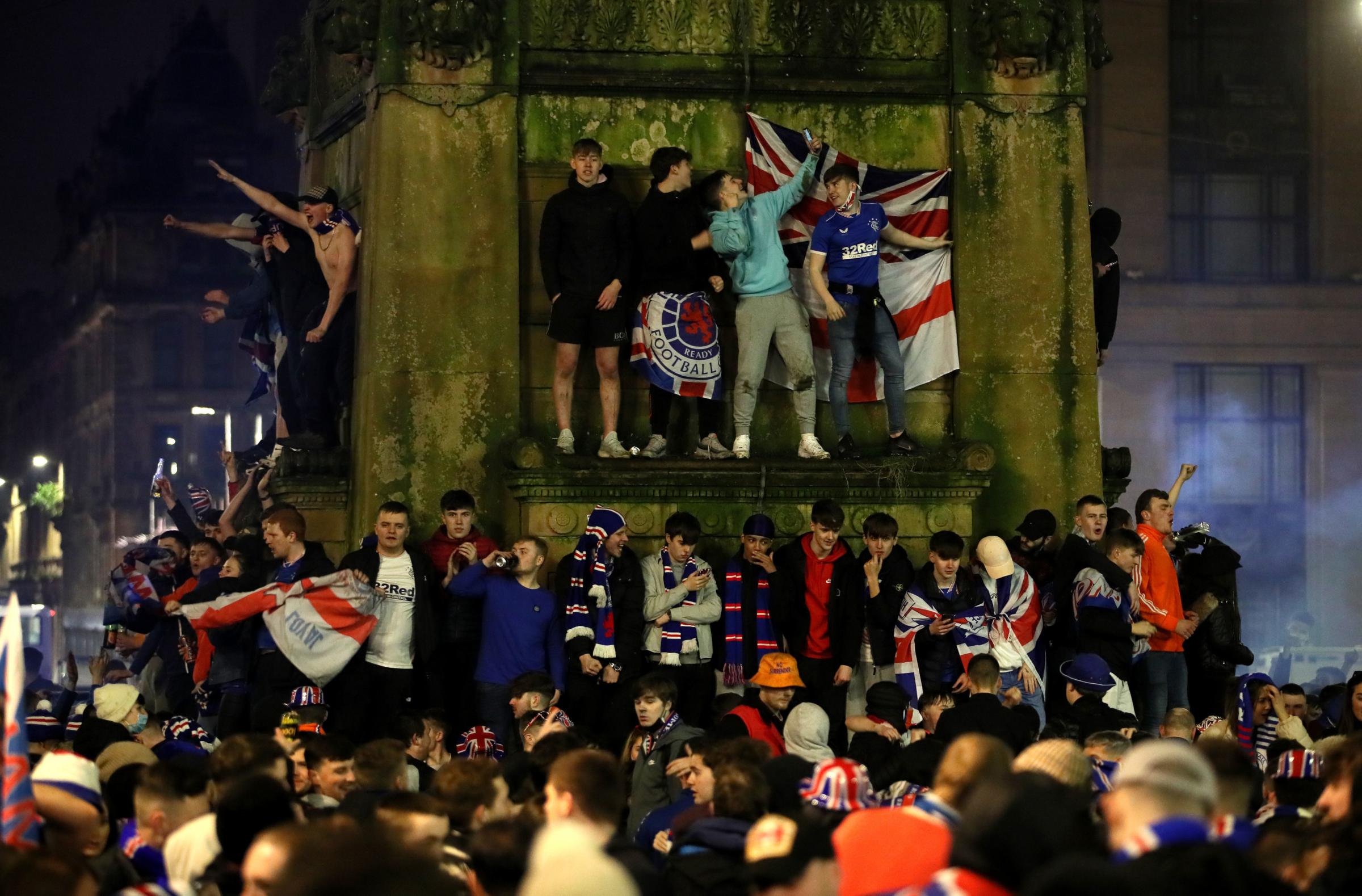 Rangers fans celebrate in George Square after Rangers win the Scottish Premiership title. Picture: Jane Barlow/PA Wire