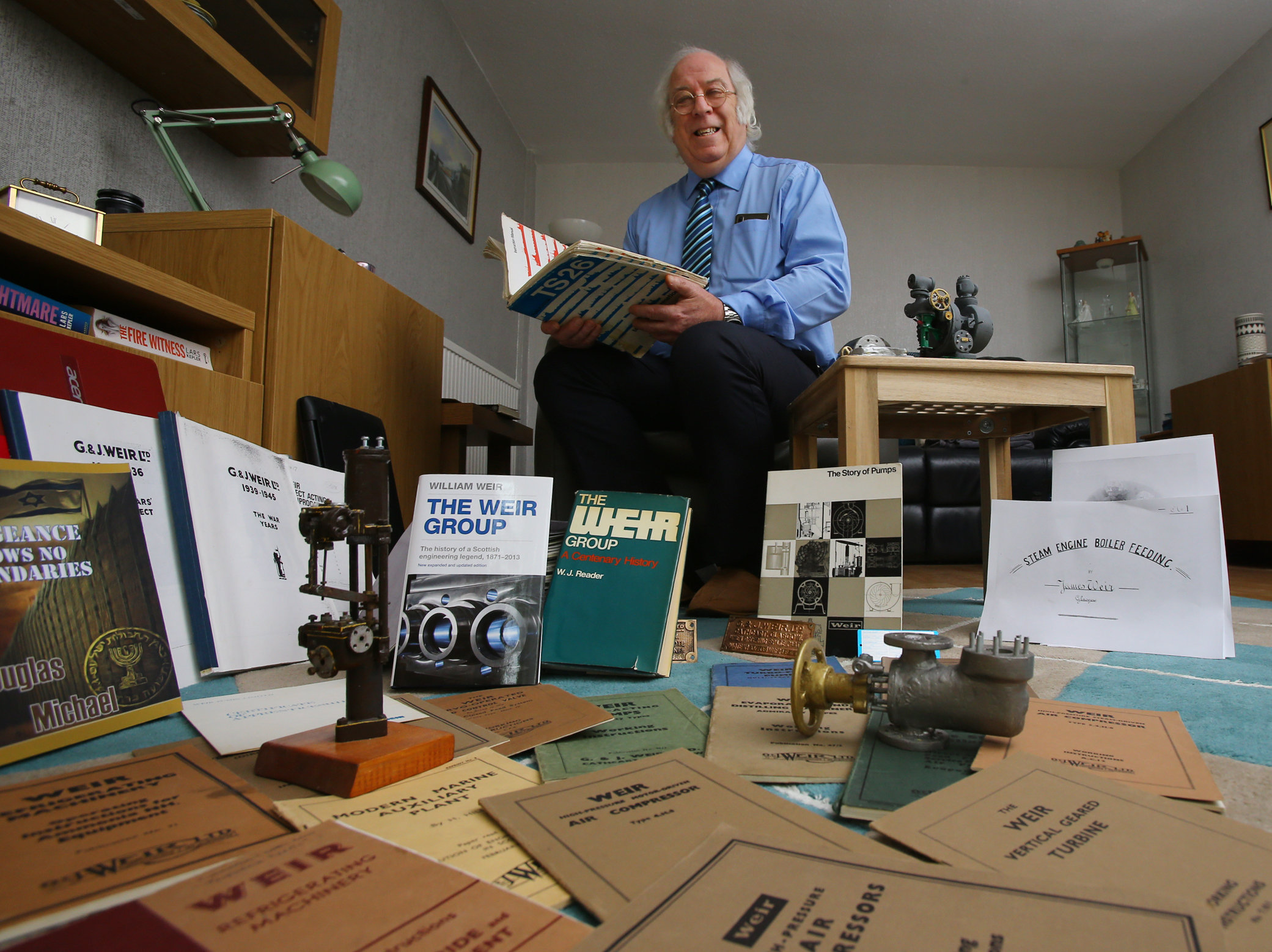 Doug Michael pictured at home in East Kilbride with items relating to Weirs of Cathcart. Doug is an engineer who used to work at Weirs is writing a book about Glasgow’s famous Weirs of Cathcart... Photograph by Colin Mearns.24 February 2021.For