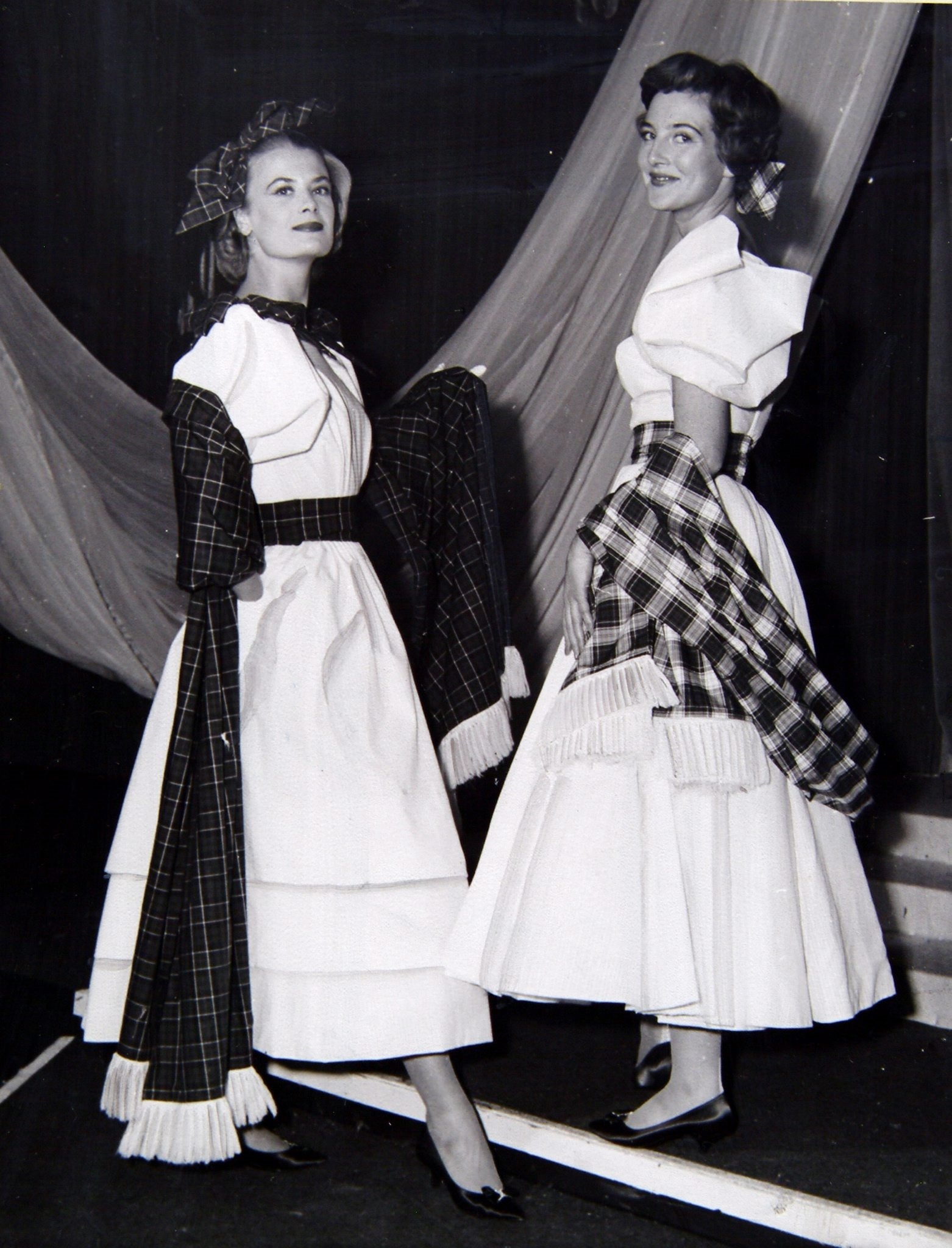 Judy Morgan, left and Susan Bayley display some of the textiles used in the Scottish Industries Exhibition in the Kelvin Hall, 1959