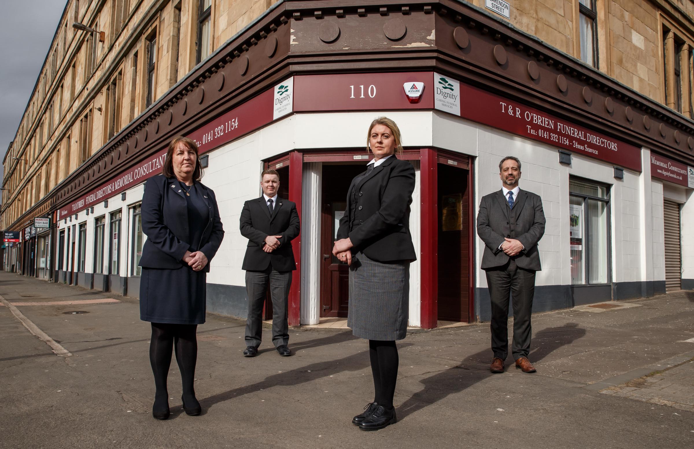 Carol Robertson, Frazer McGown, Linda McGreskin and John Boyle outside their premises on Maryhill Road Picture: Colin Mearns
