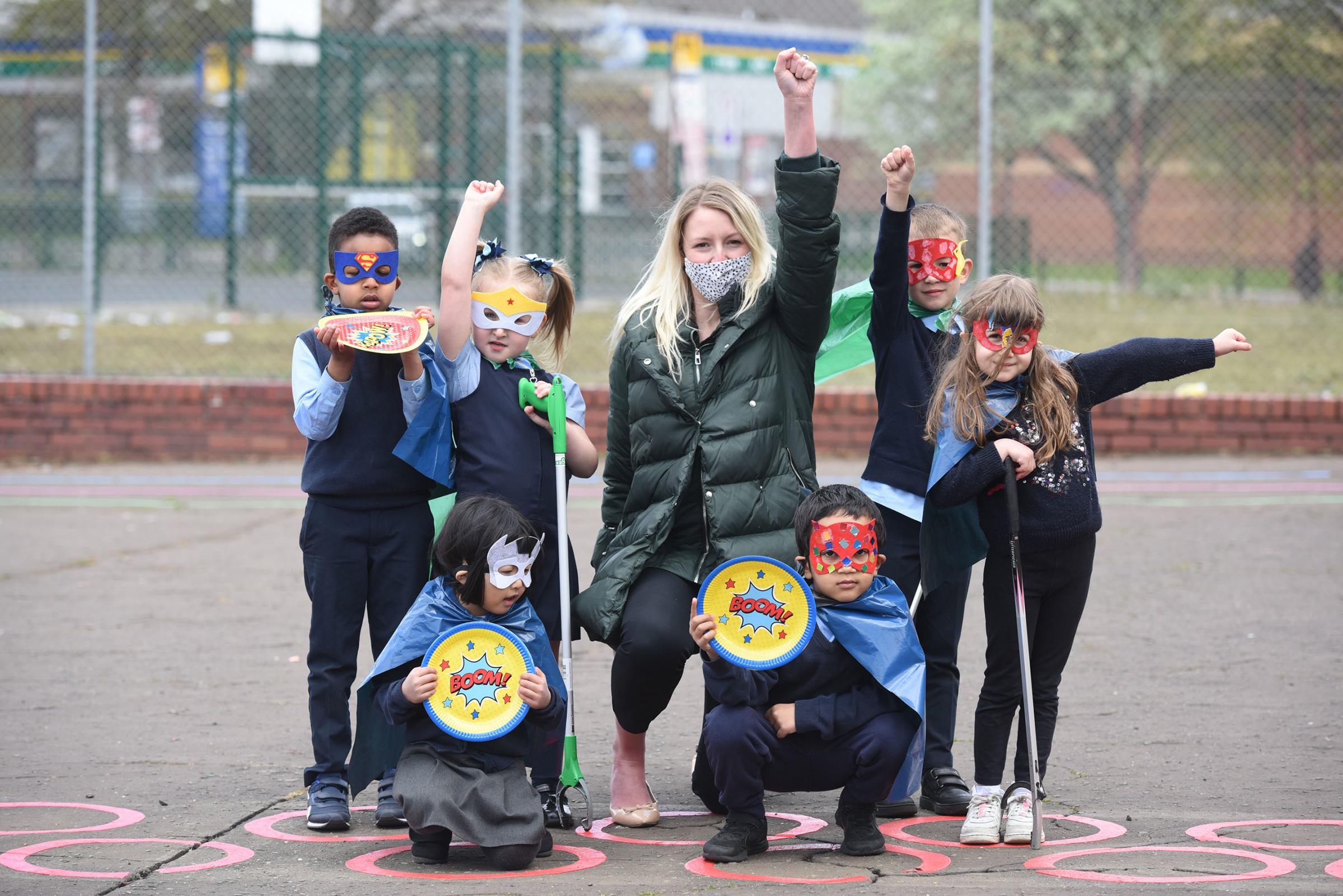 The mighty Litterless Superheroes from St Josephs Primary with Principal Teacher Laura Slinger. Pic: Kirsty Anderson/Glasgow Times