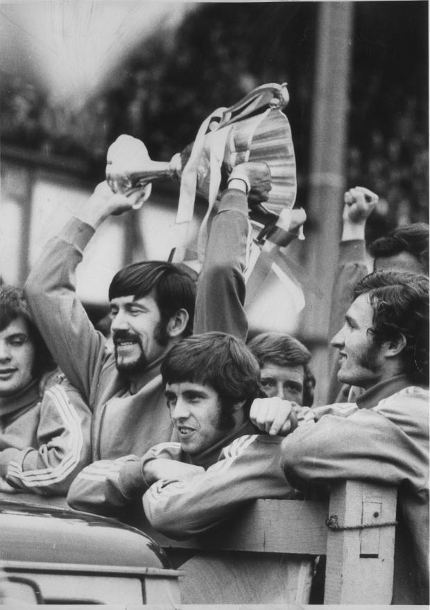Glasgow Times: Rangers Captain John Greig lifts the European Cup Winners Cup on a celebration tour of Ibrox, May 26, 1972
