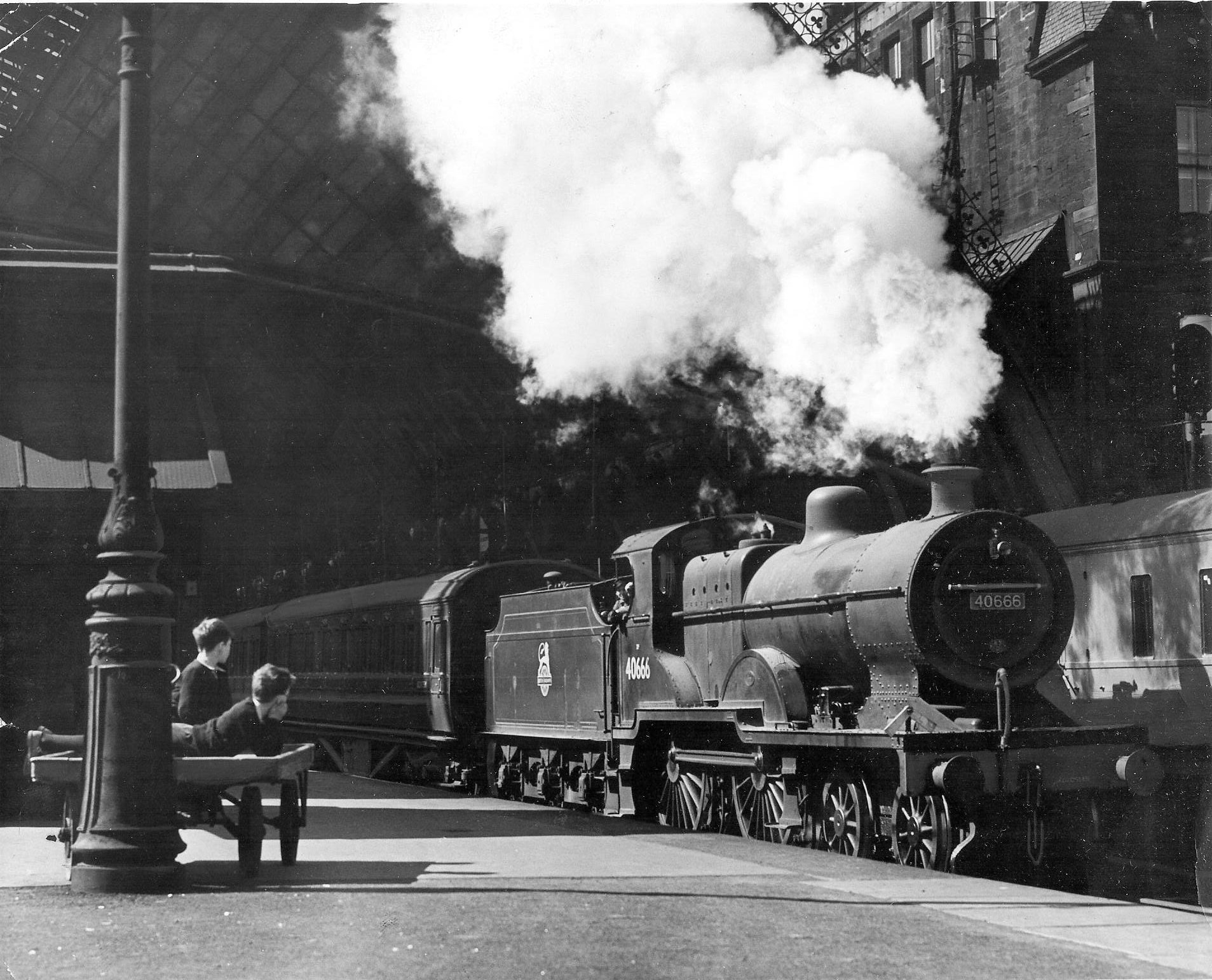 Watching the trains at St Enoch Station. Pic: Herald and Times