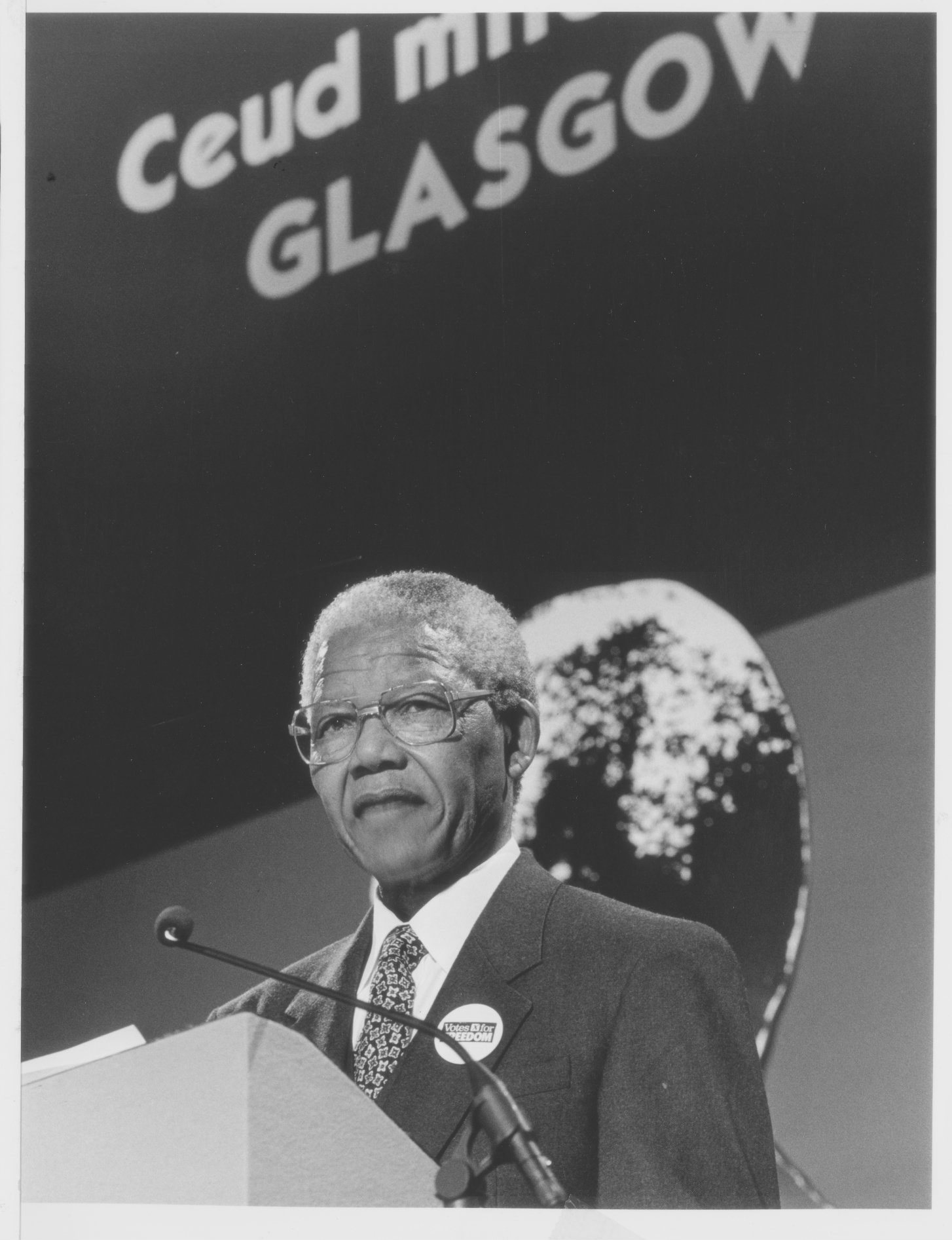 Former South African President Nelson Mandela giving a speech on stage during his visit to Glasgow in October 1993.