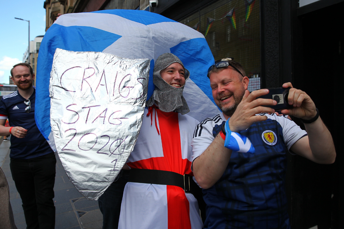Glasgow lads dress up pal as English knight ahead of Scotland game