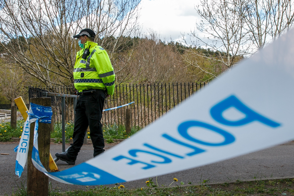 Glasgow cops lock down Gogar Street in Riddrie after woman found dead