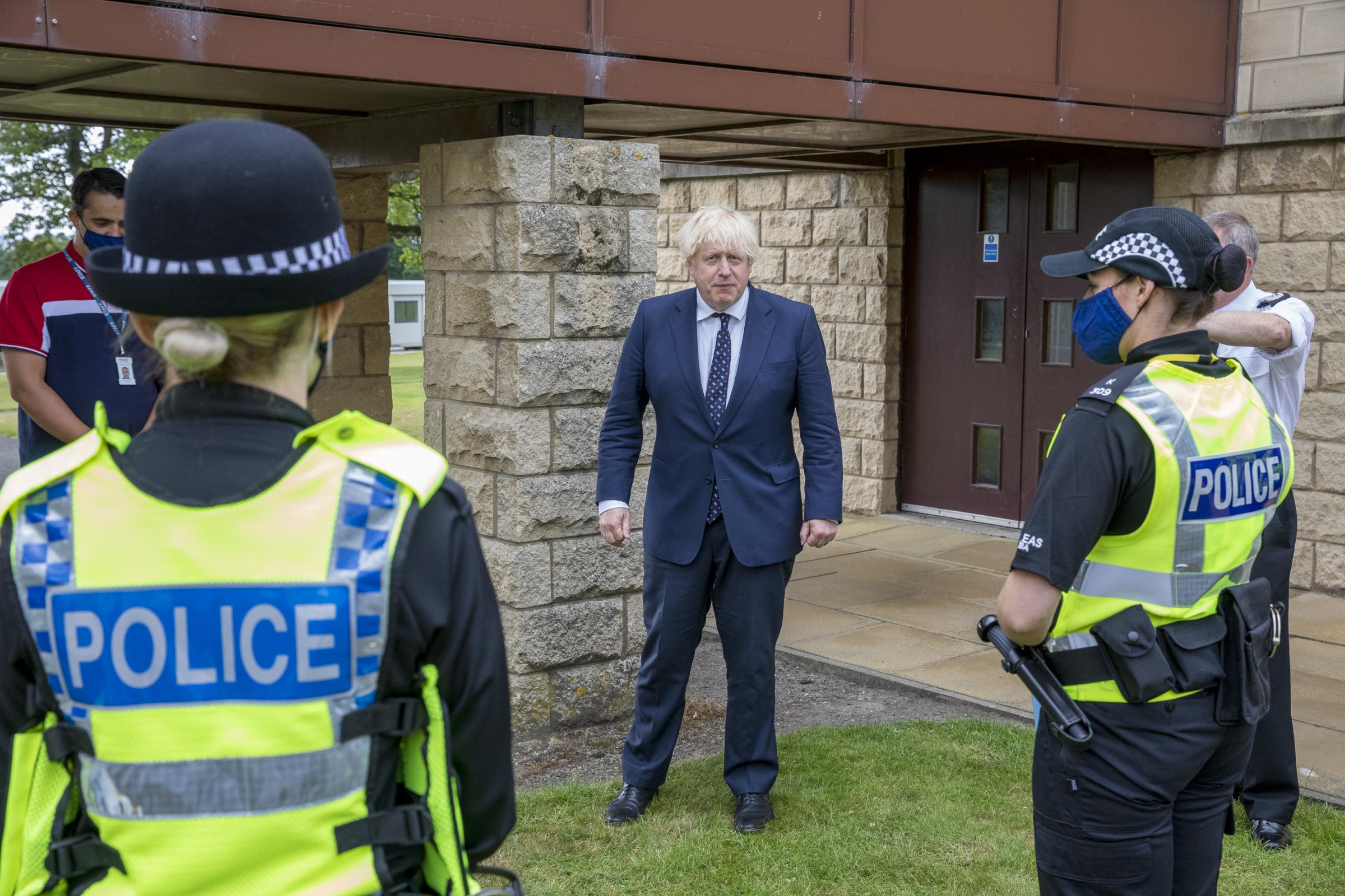 Boris Johnson promises funding for 10,000 police officers at Glasgow's COP26