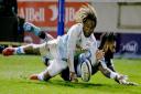 SALFORD, ENGLAND - JANUARY 18:  Marland Yarde (L) of Sale Sharks in action with Niko Matawalu of Glasgow Warriors during the Heineken Champions Cup Round 6 match between Sale Sharks and Glasgow Warriors at AJ Bell Stadium on January 18, 2020 in Salford,