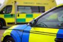 Man rushed to hospital after crash between FOUR vehicles