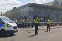 East Dunbartonshire street cordoned off as police swoop on supermarket forecourt
