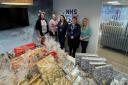 NHS 24 staff provide gifts for care home and animal shelter
