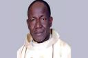 Father Isaac Achi