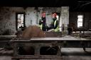 Restoration of the stables and sawmill in Pollok Country Park. Pictured are Alex Fleming-Knox (programme officer with Glasgow City Council), left and colleague Jane Slater, right, (assistant programme officer with GCC) in the saw mill. The A-Listed