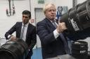 LONDON, ENGLAND - OCTOBER 27: British Prime Minister Boris Johnson and Britain's Chancellor Rishi Sunak visit 'Fourpure Brewery' in Bermondsay on October 27, 2021 in London, England. Earlier in the day, Sunak presented the government's