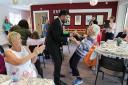 Humza Yousaf dances with Glasgow care home resident