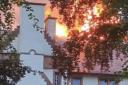 999 crews still battling huge blaze at historic hotel