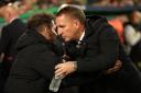 Brendan Rodgers greets Atletico manager Diego Simeone