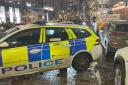 Police block off busy Glasgow street after woman attacked