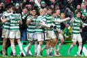 The Celtic players celebrate Kyogo's goal