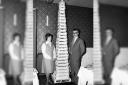 Peter's parents with the giant wedding cake
