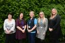 Nicola Smith, NHS Lanarkshire service development lead for podiatry, (centre) with members of the podiatry hub administration team