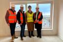 Board members and leadership team on site, Govan, Glasgow