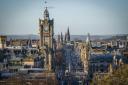 Edinburgh has banned the promotion of fossil fuel-powered cars and exotic holidays on council-owned advertising spaces