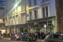Dozens of fans queue outside Glasgow music store to see legendary band