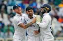 Shoaib Bashir, centre, took three wickets as England made inroads (Ajit Solanki/AP)