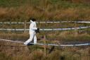 Police at the scene in the Pitilie area on the outskirts of Aberfeldy, Perthshire (Andrew Milligan/PA Wire)