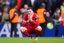 Andy Robertson insists Liverpool will pick themselves up and fight on in the title race (Peter Byrne/PA)