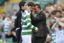Celtic manager Brendan Rodgers (right) with Patrick Roberts as he is substituted