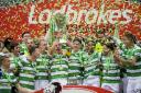 Celtic's Scott Brown lifts the trophy during the Ladbrokes Scottish Premiership match at Celtic Park, Glasgow