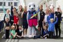 Glasgow 2018 ambassador Max Whitlock, with (back row, L-R) Glasgow City Council leader Susan Aitken, Minister for Health and Sport Aileen Campbell, Glasgow 2018 mascot Bonnie the Seal, and Glasgow Lord Provost Eva Bolander