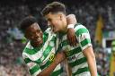 Celtic's Mikey Johnston celebrates with Karamoko Dembele after his winner against Hearts