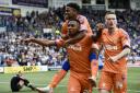 Alfredo Morelos celebrates with Dapo Mebude and Ryan Jack after scoring at Rugby Park