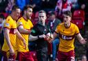 Motherwell players can't believe it after referee Craig Napier sends off Jack Vale.