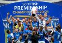 James Tavernier lifts the Scottish Premiership trophy following his side's 4-0 win over Aberdeen