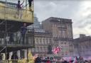A small number of fans could be seen climbing scaffolding